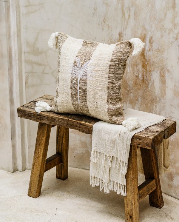 Striped raw cotton and jute cushion cover with pom poms